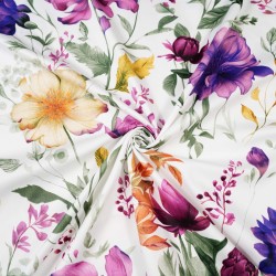 Patterned cotton satin with purple-beige flowers on a white background