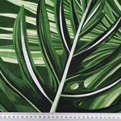 Patterned cotton satin with large green leaves with glitter