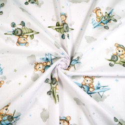 Cotton 100% teddy bears in green blue planes on a white background