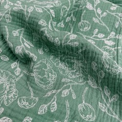 Double gauze printed flowers outlines on a sage background