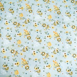 Cotton 100% bees with flowers on a blue meadow