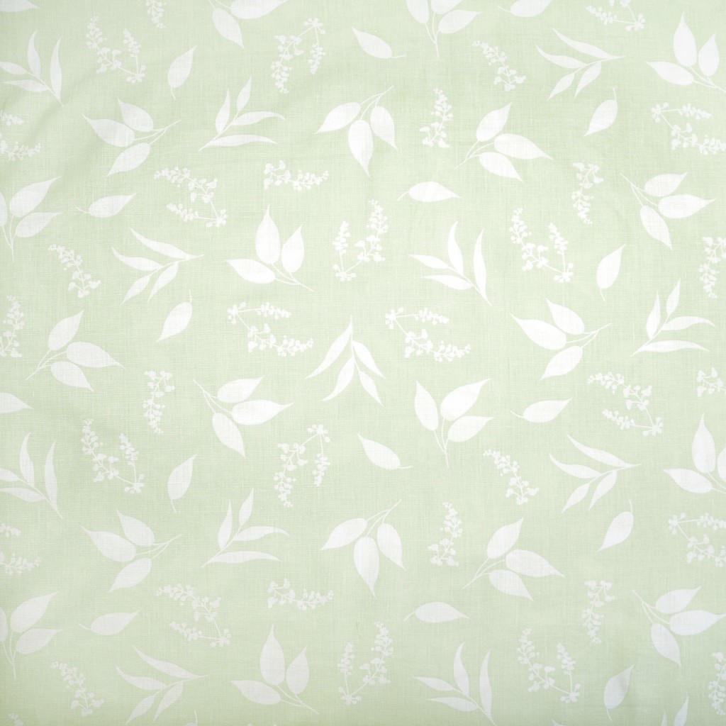 Cotton 100% white leaves on pistachio background