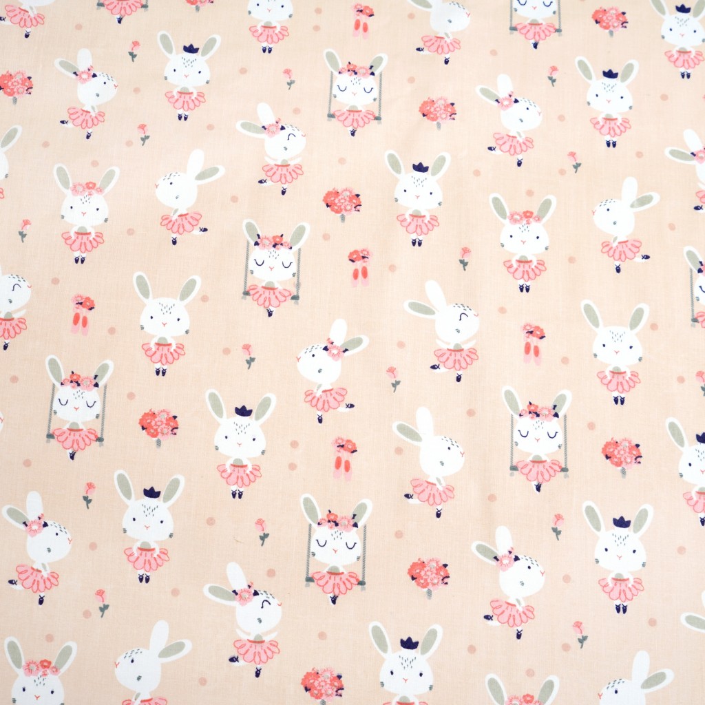 Cotton rabbits on apricot background