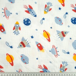 Double gauze muslin with rockets in space print