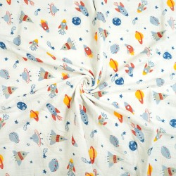 Double gauze muslin with rockets in space print