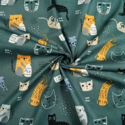 Cotton 100% orange cats on a sage background