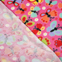 Soft fleece colorful butterflies on pink background