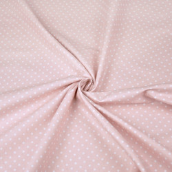 Cotton 4mm white dots on a dirty pink background