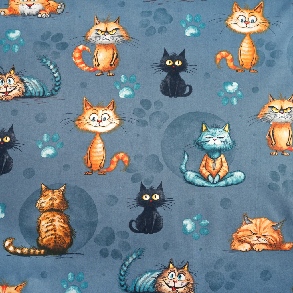 Cotton 100% orange-red cats on a denim background