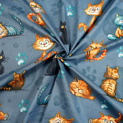 Cotton 100% orange-red cats on a denim background