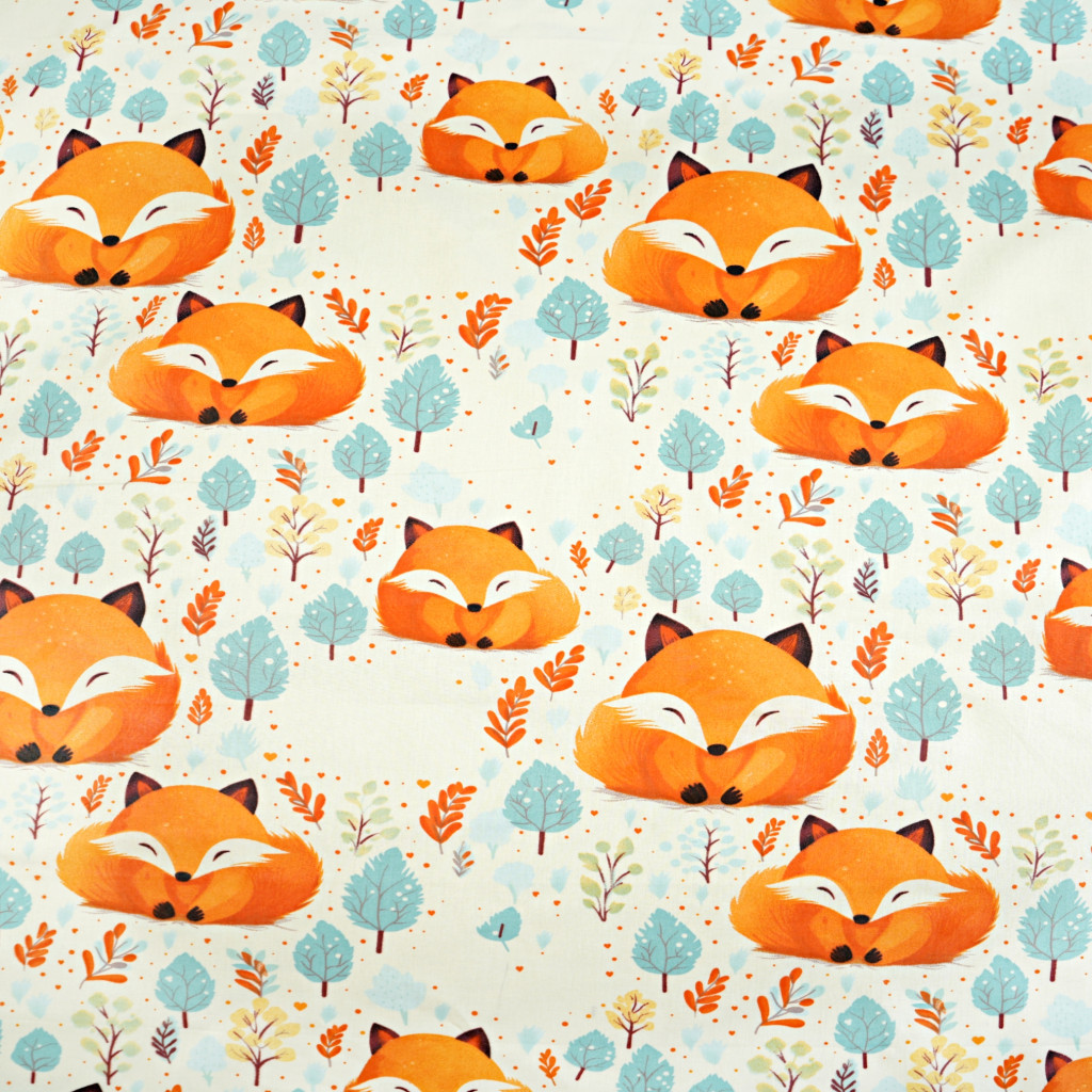 Cotton 100% large orange foxes on an ecru background