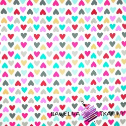 Cotton colorful hearts on white background