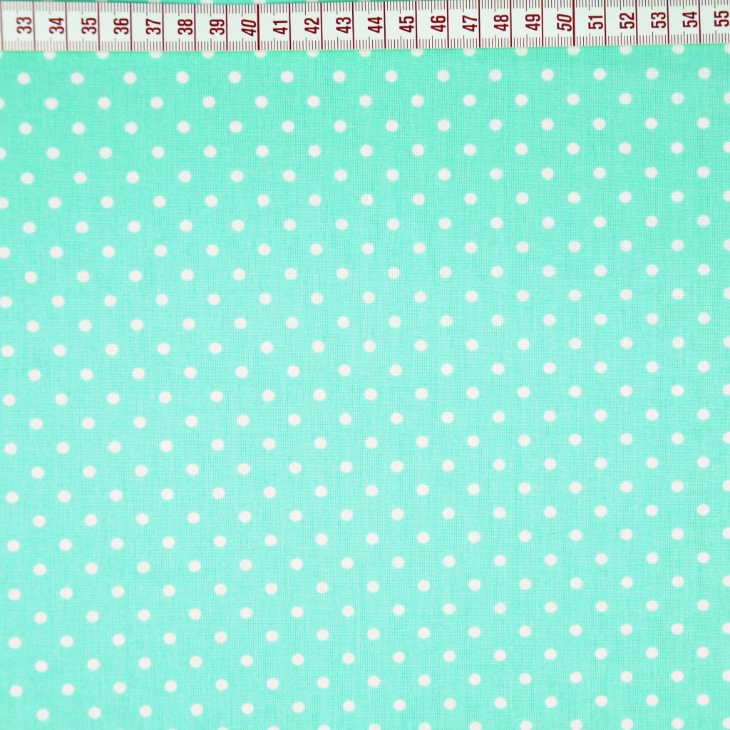 Cotton white dots on mint background