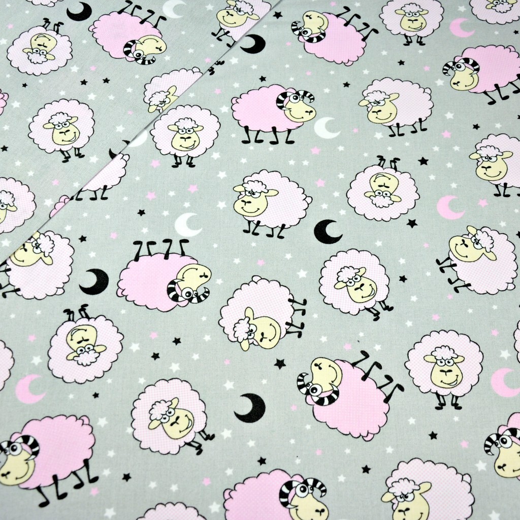 Cotton pink sheep on gray background