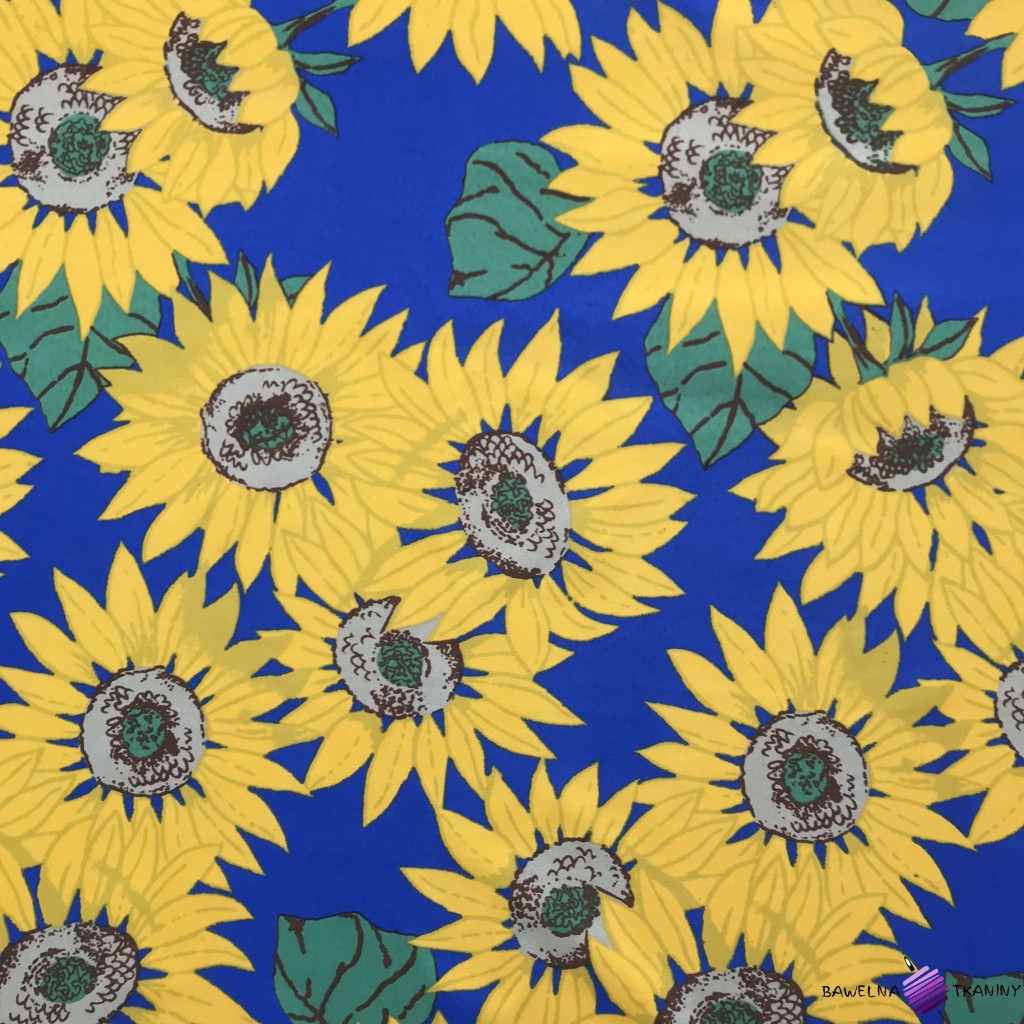 Waterproof fabric sunflowers on green background