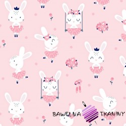 Bawełna króliki na huśtawkach na różowym tle