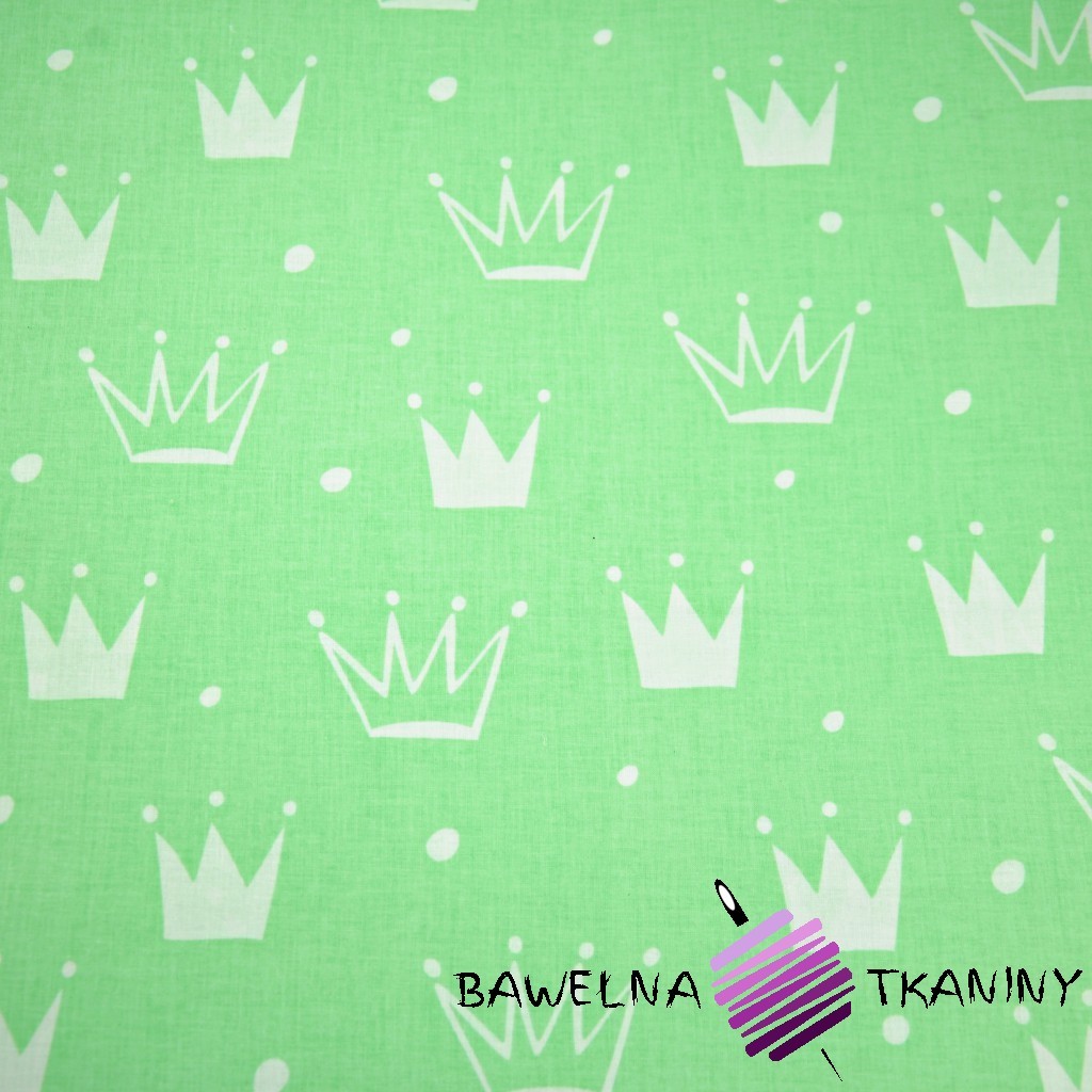 Cotton white crowns with dots on green background