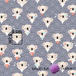 Cotton koala in the cinema on a gray background