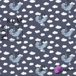 Cotton birds with headphones on a dark gray background