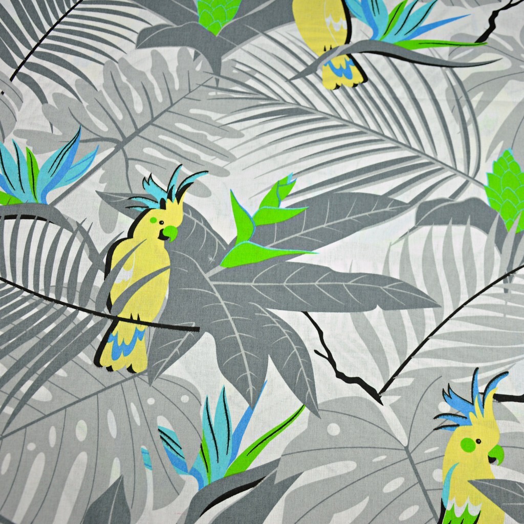 Cotton yellow parrots on gray leaves