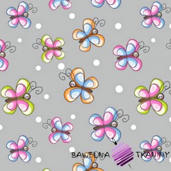 Cotton colourful butterflies with dots on white background