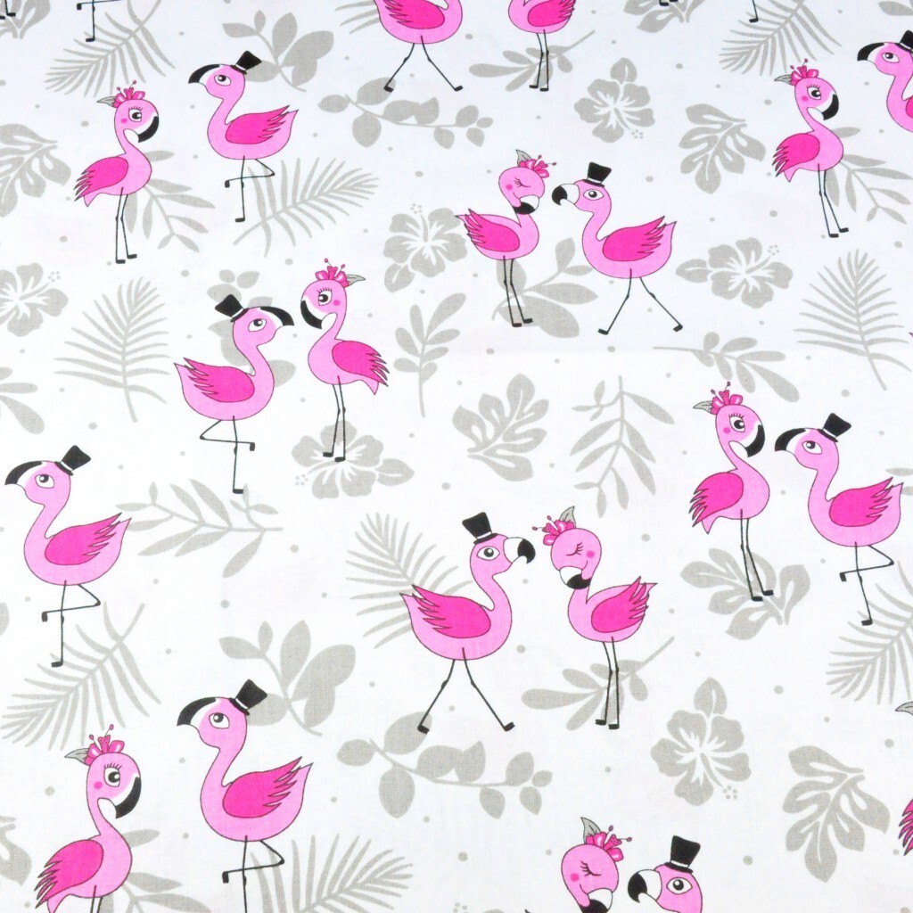 Cotton pink flamingos with leaves on a white background