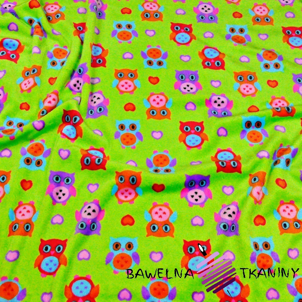 Soft fleeece colorful owls on a green background
