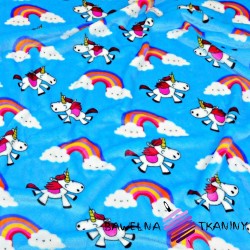 Soft fleeece unicorns on a blue background