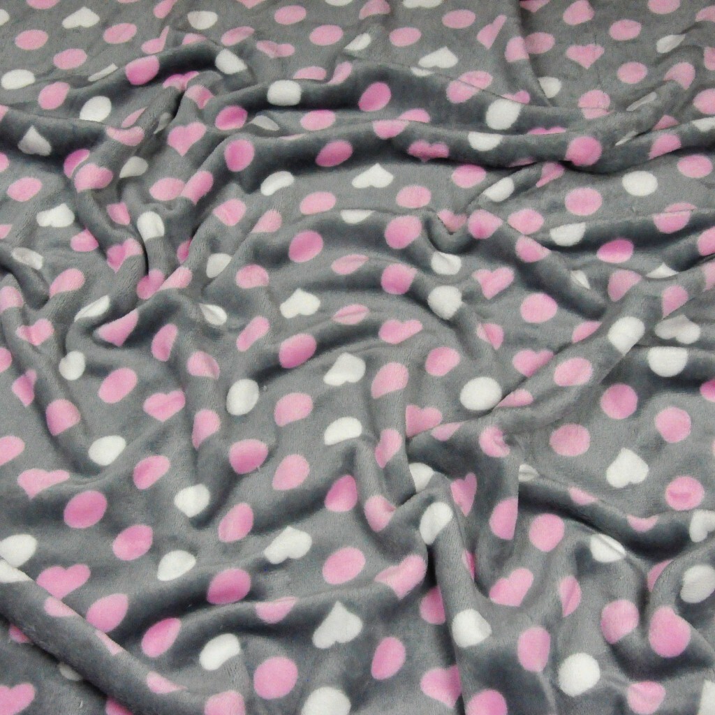 Soft fleeece white dots and pink hearts on a gray background