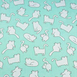 Cotton white cats on mint background