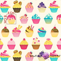 Colorful chocolate muffins on a ecru background