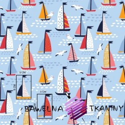 Cotton colorful sailboats on a blue background