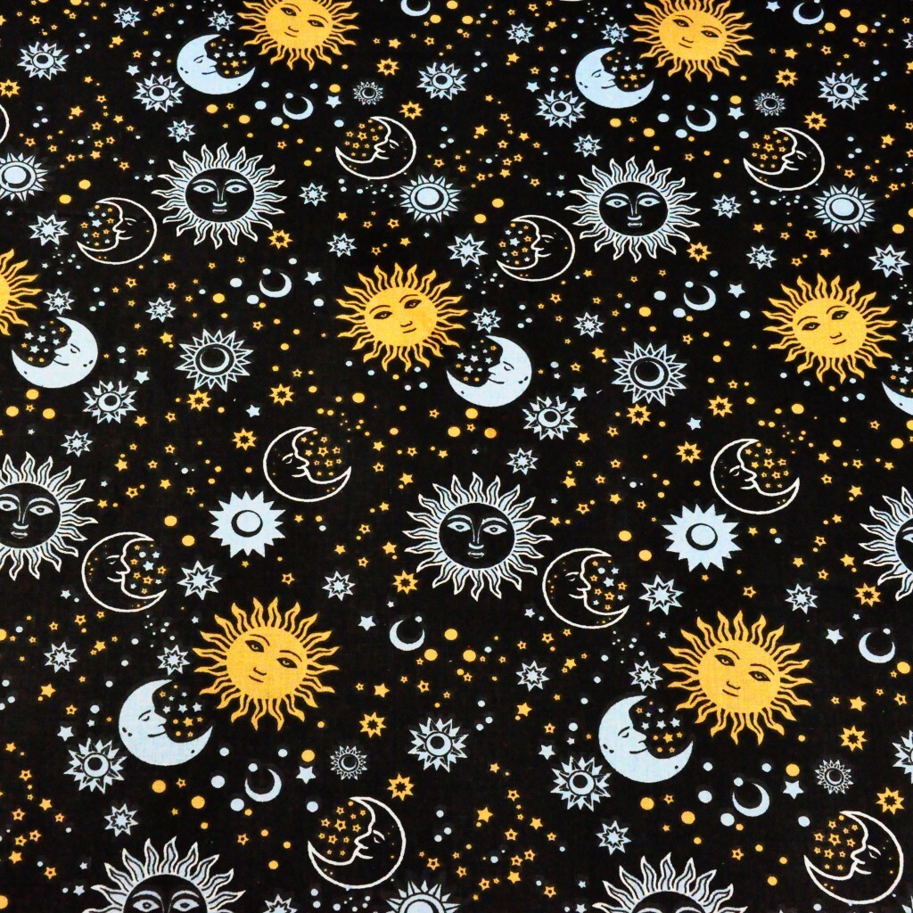 Cotton sun and moons on a black background