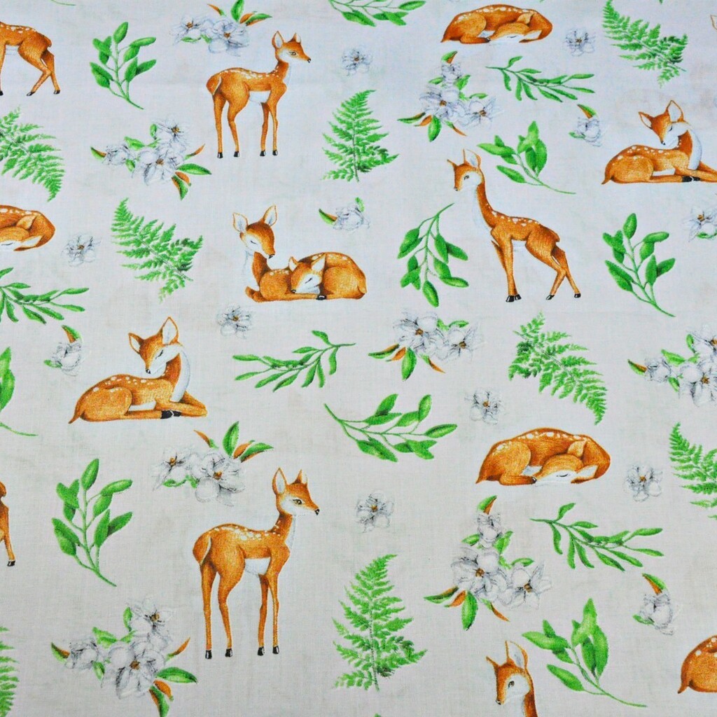 Cotton deer with leaves on a light gray background