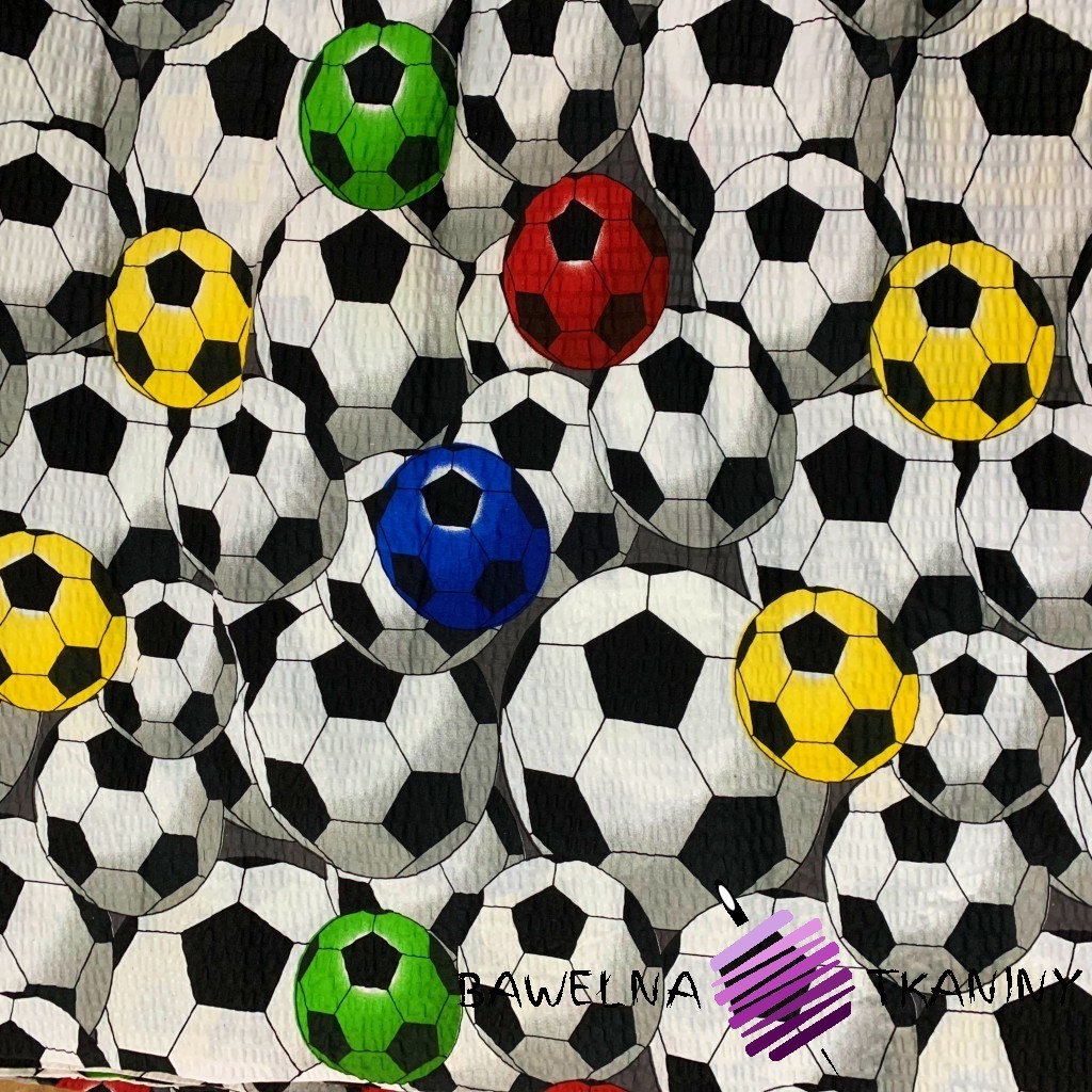 seersucker colourful footballs on white background