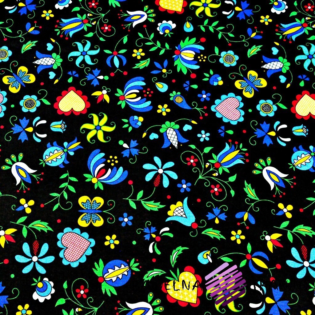 Bawełna wzór kaszubski niebieski na czarnym tle