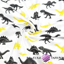 Bawełna dinozaury żółto czarne na białym tle