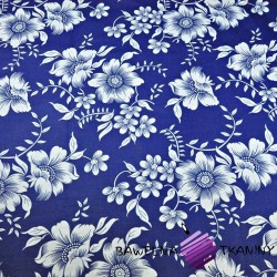 Cotton white flowers on a navy blue background