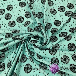 Looped knit - black dandelions on mint background