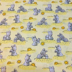 Cotton rabbits with suns on yellow background