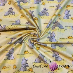 Bawełna króliki ze słoneczkami na żółtym tle