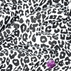 Looped knit - black brocade leopard on white background