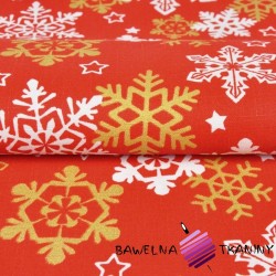 Tkanina dekoracyjna biało złote śnieżynki na czerwonym tle
