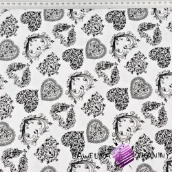 Cotton patterned black mini hearts on a white background
