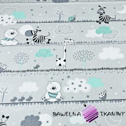 Cotton Teddy bears and mint giraffes in stripes on a gray background