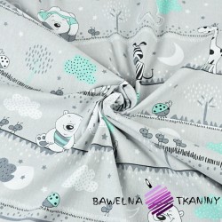 Cotton Teddy bears and mint giraffes in stripes on a gray background