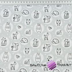 Cotton forest animals in wheels on a gray background