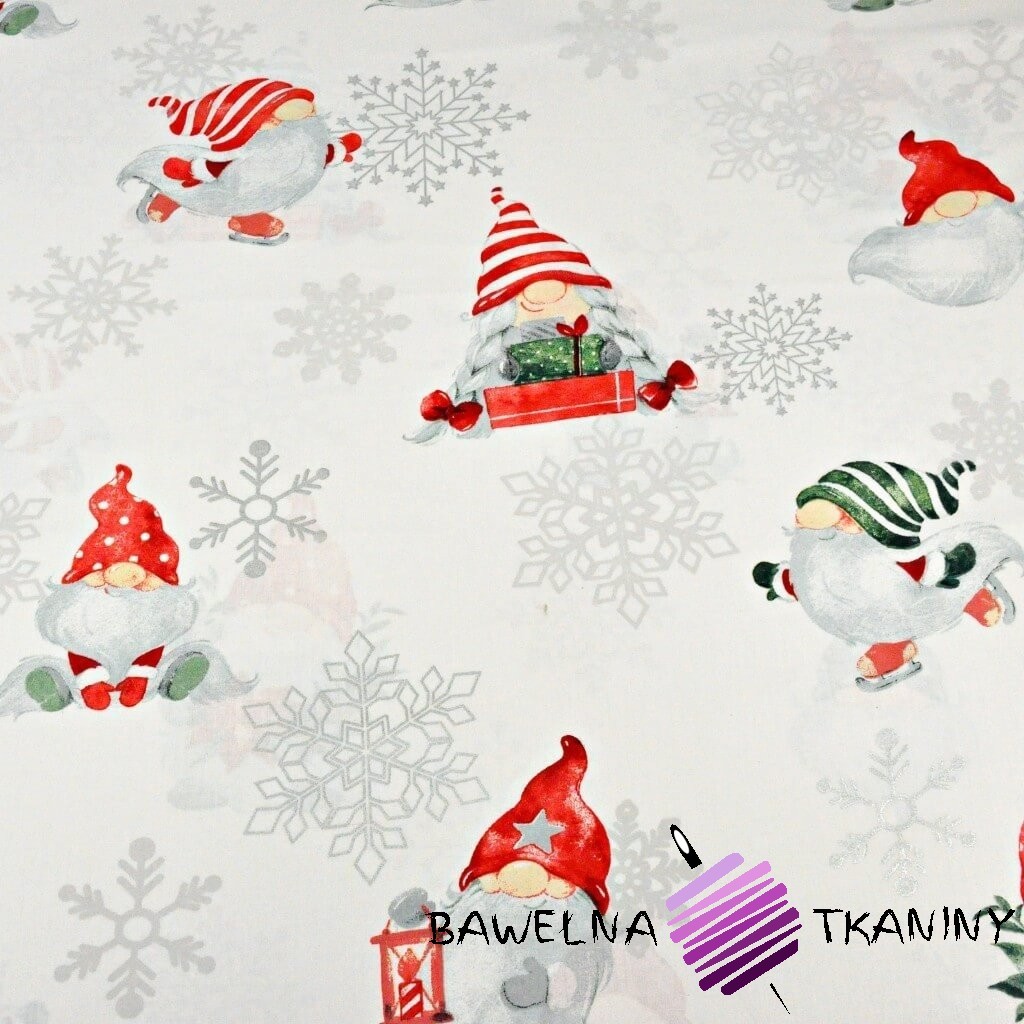 wzór świąteczny skrzaty ze posrebrzonymi śnieżynkami na białym tle