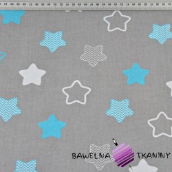Cotton white & turquoise gingerbread stars on gray background