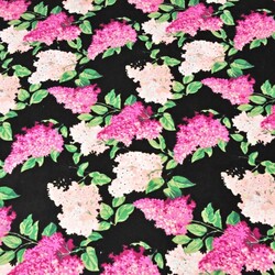 Cotton pink lilac flowers on a black background